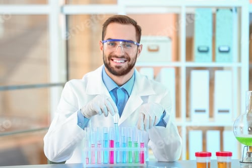 Preview: Young scientist working with test tubes in laboratory. Chemical analysis