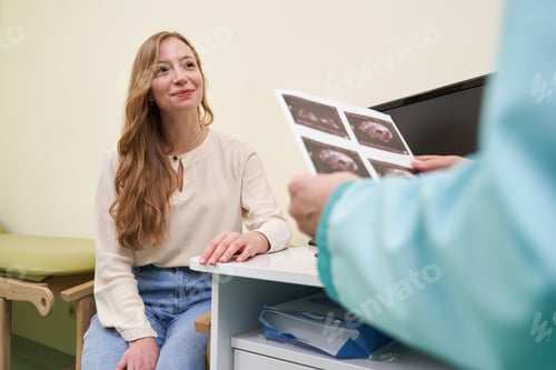 Preview: Tender longhaired woman listening to her gynecologist
