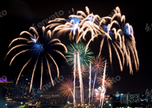 Preview: Cityscape Fireworks Light Up Night Sky Celebration
