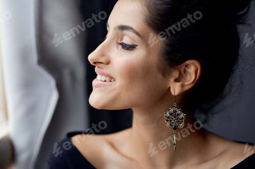 Preview: elegant lady indoors near window interior model gray curtains
