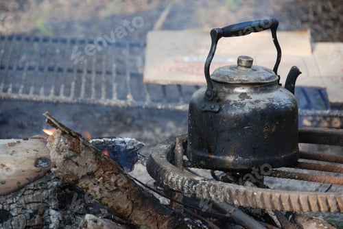 Preview: Closeup shot of a kettle on a fire