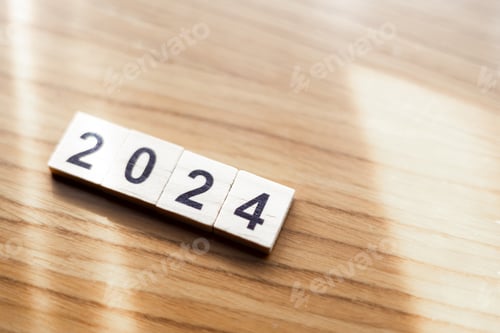 Preview: New Year 2024 on wood block. Start planning and goal