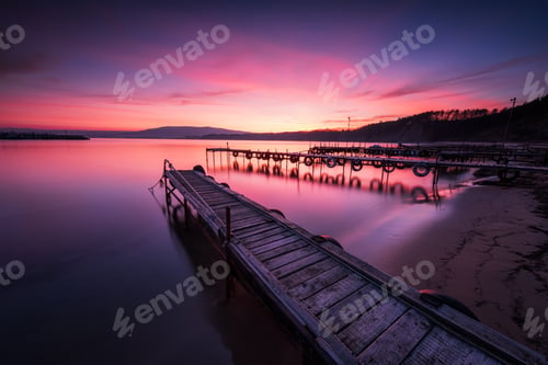 Preview: Sea sunset above wooden piers
