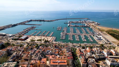 Preview: Aerial view of Vilanova i la Geltru and fishing port with boats in Catalonia, Spain
