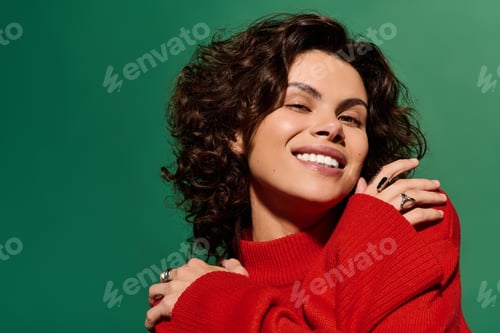 Preview: Young woman with curly hair showcases fashion in a vibrant setting with a smile