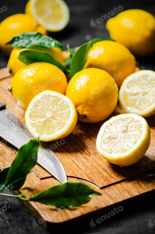 Preview: Fresh lemons. On cutting board.