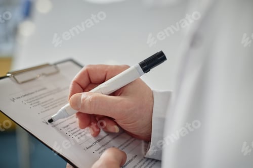 Preview: Professor Writing on Clipboard