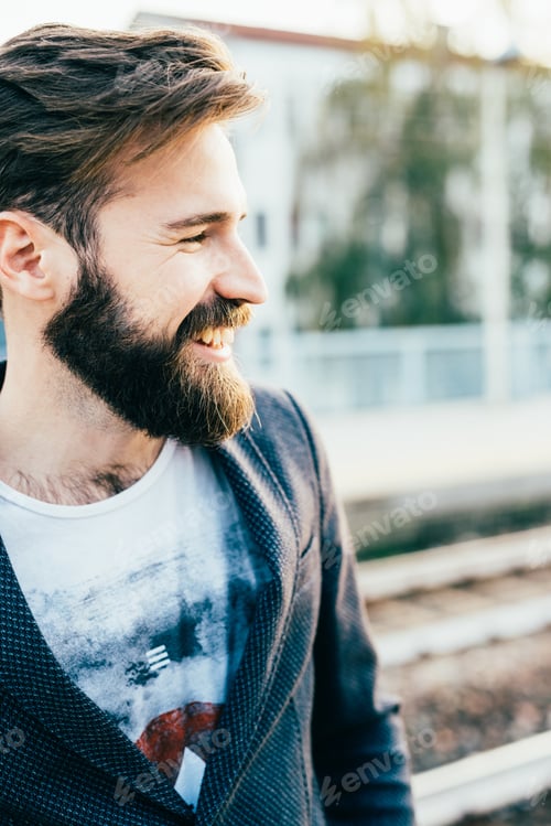 Preview: Young bearded man outdoor