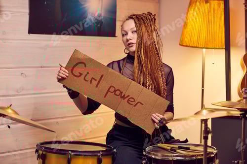Preview: Girl with poster in studio