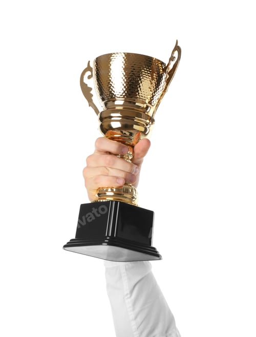 Preview: Man with golden trophy cup on white background, closeup