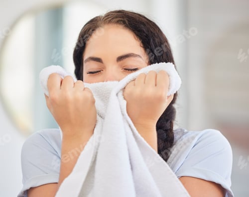 Preview: Woman, smell towel or laundry with fresh fabric, clean cloth and hospitality work in hotel, home or