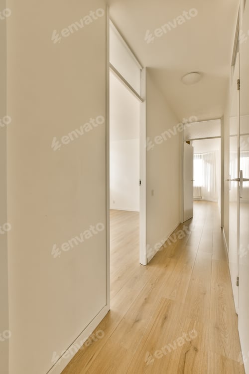 Preview: a hallway with white walls and a sliding glass door