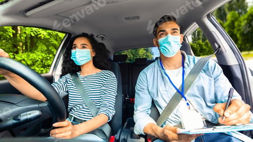 Preview: Young woman attending driving school during COVID-19 pandemic
