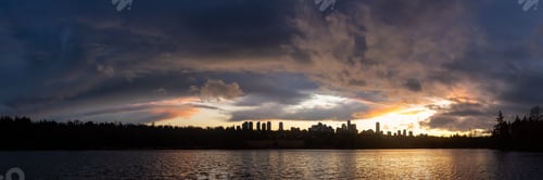Preview: Lake and Cityscape in background during colorful sunset