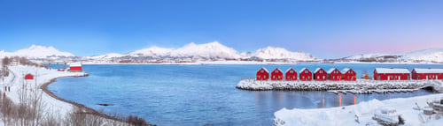 Preview: Breathtaking scenery wit traditional red wooden houses on the shore of Offersoystraumen fjord.