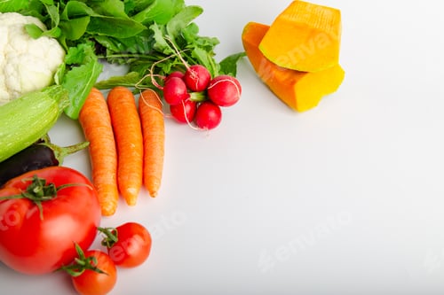 Preview: Isolated group of winter season vegetables over white flat lay view. Includes copy space.