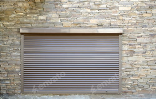Preview: A window with brown metal rolling shutters. Wall decoration with artificial flatten stone