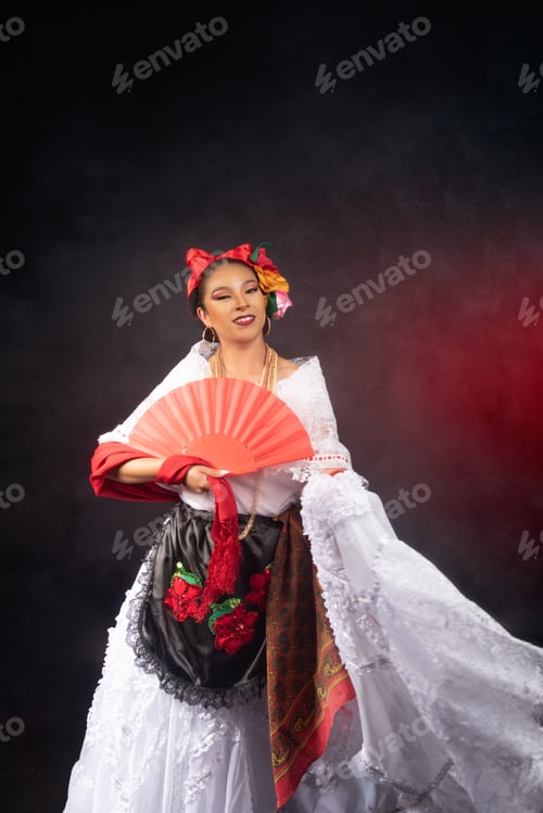 Preview: A woman in a white dress holding a red fan