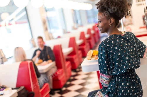 Preview: Young woman in the diner