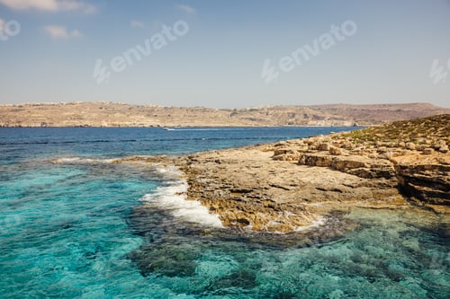Preview: Scenic rocky blue Mediterranean lagoon in Malta