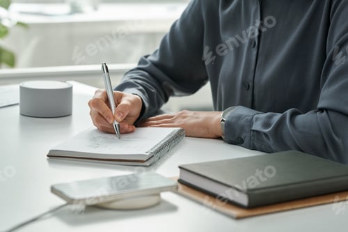 Preview: Manager writing plans in notepad