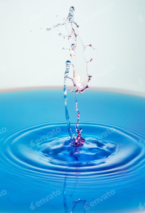 Preview: Abstract background of splash of color water, collision of colored drops