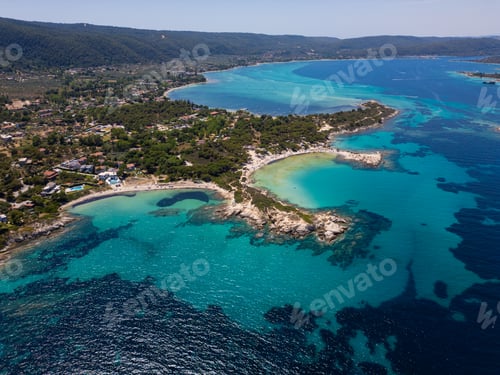 Preview: Aerial view of an island on Sithonia Peninsula, Greece, with beaches and rocks, surrounded by