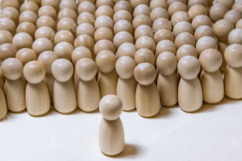 Preview: follow the leader or human resource management concept. crowd of wooden people