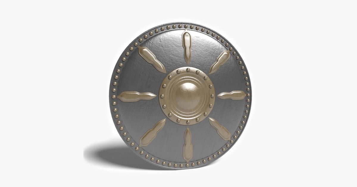 Circular metallic shield with studded perimeter and central ...