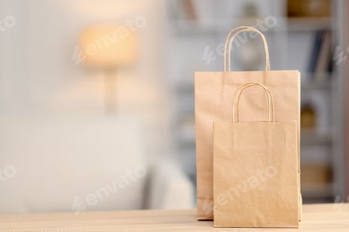 Preview: Brown Paper Shopping Bags on Wooden Table
