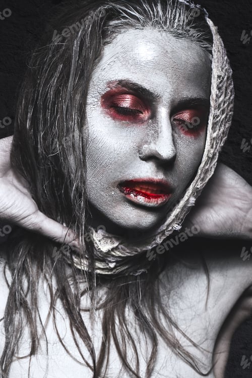 Preview: Girl in form of zombies, Halloween corpse with blood on his lips. Image for a horror film.