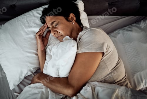 Preview: Headache, stress and senior woman in bed from above with depression, insomnia or menopause. Anxiety