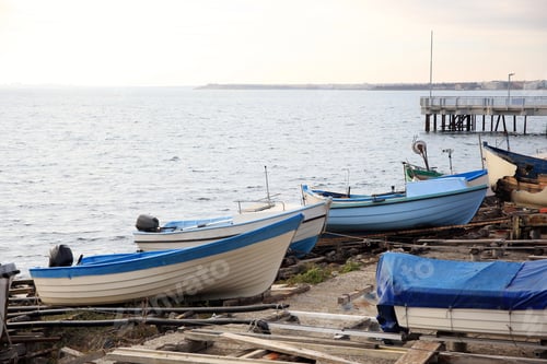 Preview: Moored boats on beach near sea outdoors