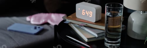 Preview: Header of Alarm Clock on Nightstand