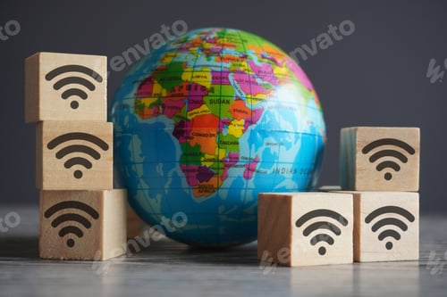 Preview: Closeup image of globe and wooden cubes with wifi icon.