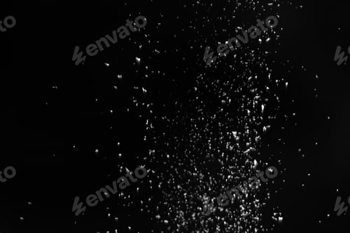 Preview: Snow flakes falling on black background. Winter weather
