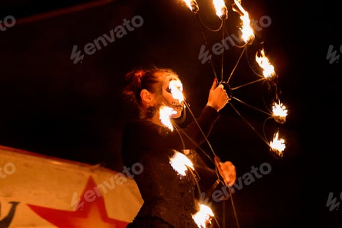 Preview: ↟ Fire show. Fire dancer dances. Night performance. Dramatic portrait. Fire and smoke