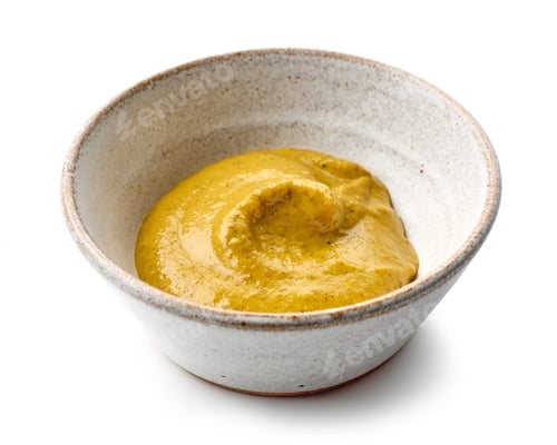 Preview: Close-up of Mustard in Ceramic Bowl