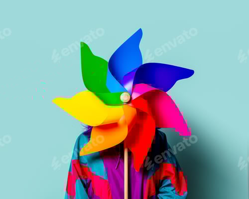 Preview: Stylish white girl in 80s tracksuit hold pinwheel on blue background