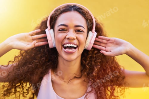 Preview: Music, portrait and freedom with a black woman listening to the radio outdoor on a yellow wall back