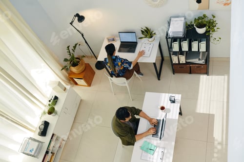 Preview: Colleagues Working In Modern Office