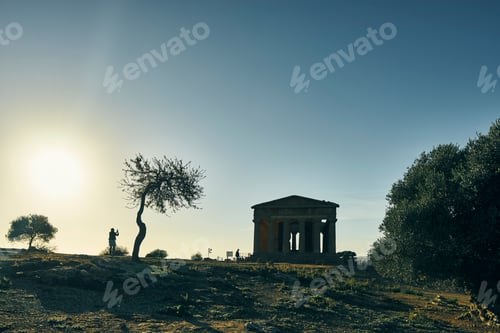 Preview: Silhouetted view of Temple of Concordia, Valley of Temples, Agrigento, Sicily, Italy