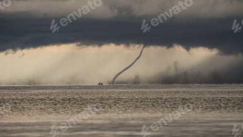 Preview: Upcoming storm with tornado hitting the water at lake malawi