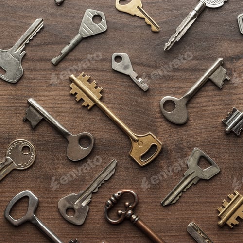 Preview: Overhead Of Many Different Keys In Oder On Wooden Background Concept