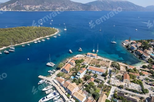 Preview: Drone aerial view Greek harbour village of Fiskardo on the Northern tip of Kefalonia Greek island