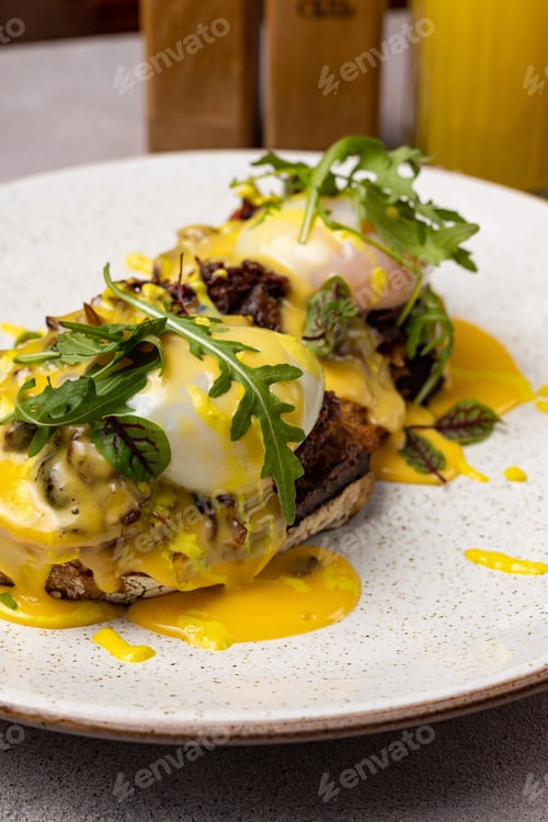 Preview: Delicious plate with freshly prepared breakfast made of toasted bread, toppings, and vegetables