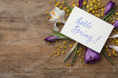 Preview: Card with words HELLO SPRING and fresh flowers on wooden table, flat lay. Space for text