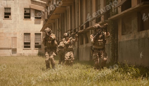 Preview: Professional marine soldiers training with weapon on a military range.