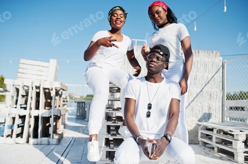 Preview: Stylish african american friends in white