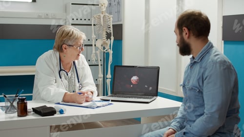 Preview: Health specialist showing coronavirus illustration on laptop